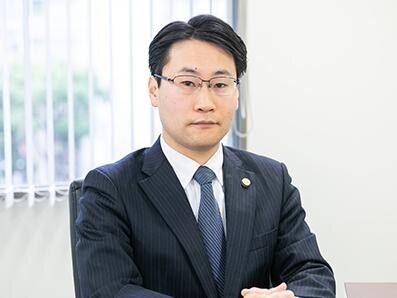 高橋 旦長弁護士