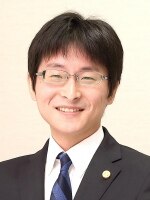 安達 和茂