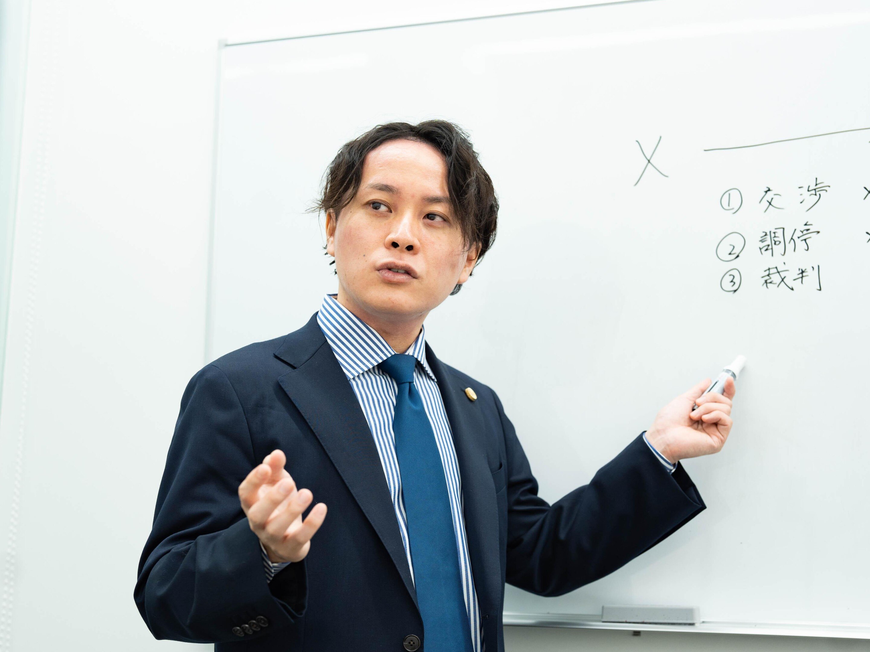 塚越 文也弁護士